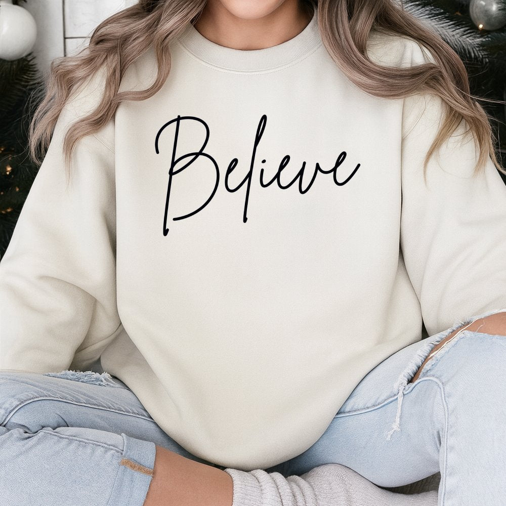 Believe Christmas Sweatshirt | Minimalist Script Graphic Design | Soft Cotton Blend | Festive Holiday Gift for Women and Men