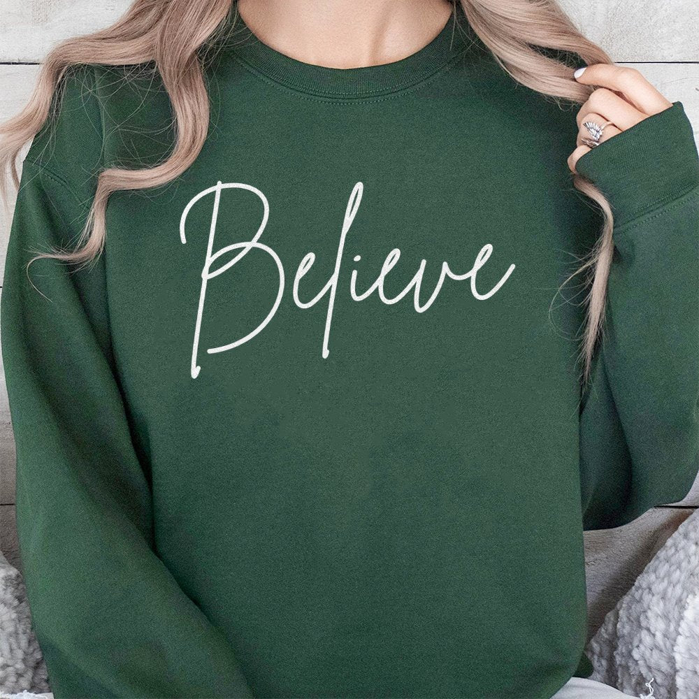 Believe Christmas Sweatshirt | Minimalist Script Graphic Design | Soft Cotton Blend | Festive Holiday Gift for Women and Men
