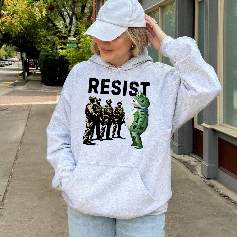 Resist Frog Hoodie | Activism Protest Graphic | Premium Cotton-Blend Apparel | Unisex Cozy Gift for Social Justice Advocates